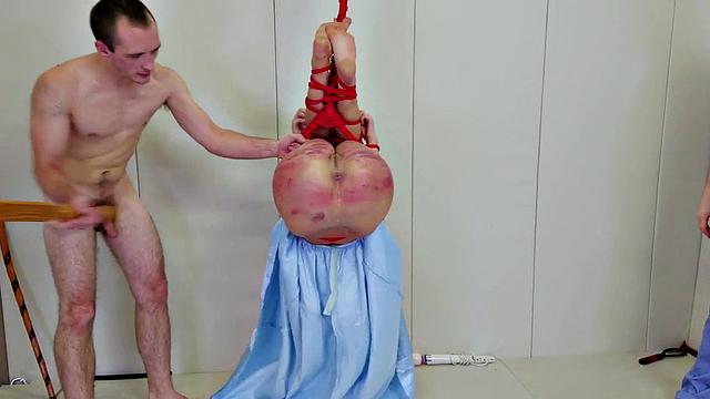 Paddled sub screams as she's whacked hard