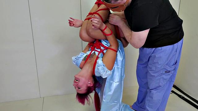 Paddled sub screams as she's whacked hard