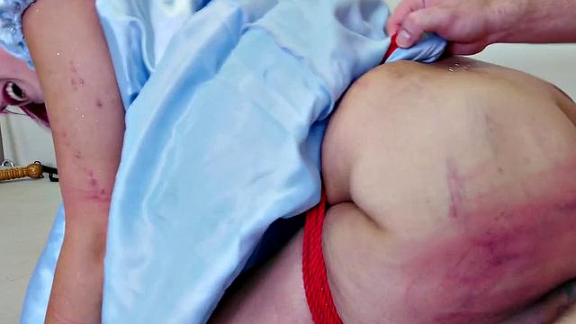 Paddled sub screams as she's whacked hard