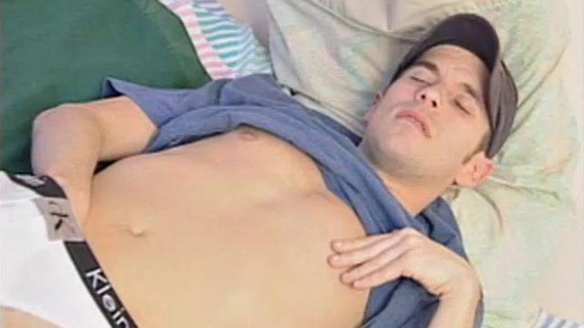 After getting off the phone, 21 year old frat boy Sean Storm feels the urge to jack off, instead of study. He pushes the books aside and starts rubbing his package. Then he slowly removes his shirt to reveal an awesome six pack.