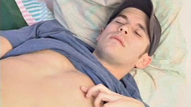 After getting off the phone, 21 year old frat boy Sean Storm feels the urge to jack off, instead of study. He pushes the books aside and starts rubbing his package. Then he slowly removes his shirt to reveal an awesome six pack.