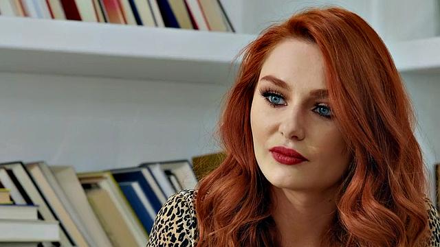 Big-booty redhead secretary passionately riding her boss