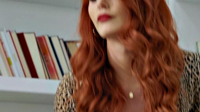 Big-booty redhead secretary passionately riding her boss