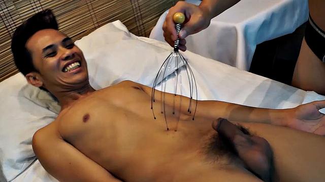 Asian gay tickling fetish boy visits the Erotic Asian Tickling Parlor for a sensual tickling experience. Our tickling masseur uses feathers and wire scalp massaging tool.