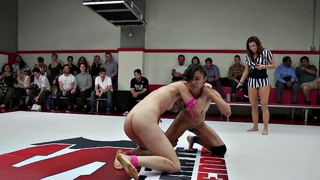 Lesbian Asian wrestler facesits during wrestling round