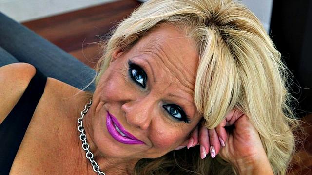 Big tits in fishnet stockings