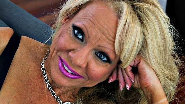 Big tits in fishnet stockings