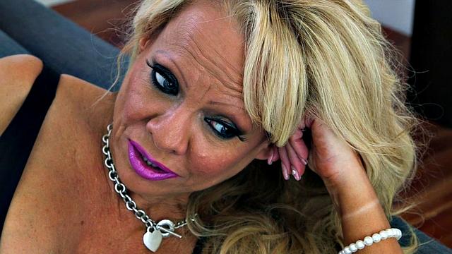 Big tits in fishnet stockings