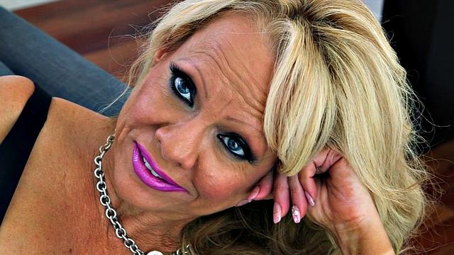 Big tits in fishnet stockings