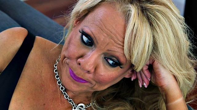 Big tits in fishnet stockings