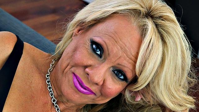 Big tits in fishnet stockings