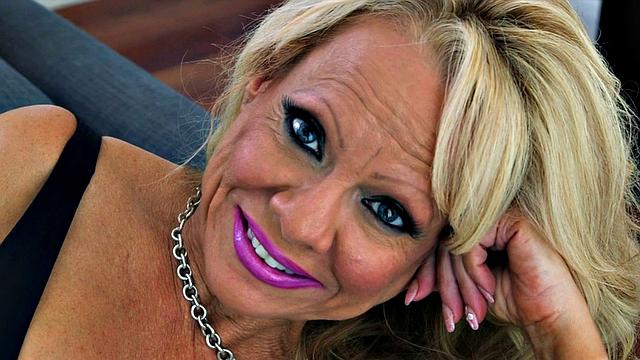 Big tits in fishnet stockings