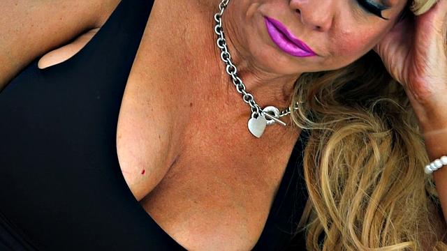 Big tits in fishnet stockings