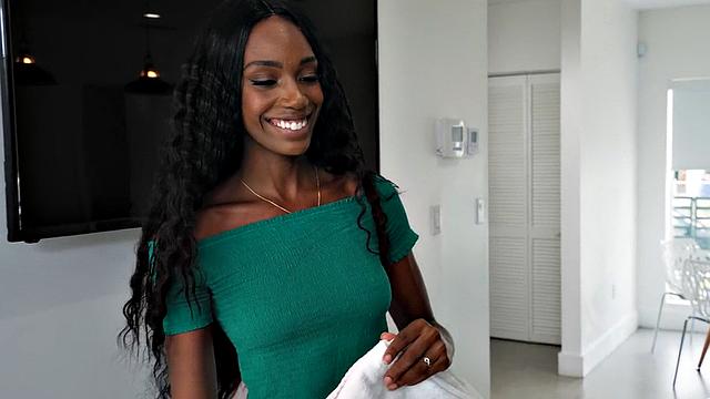 Ebony tattooed masseuse riding her white client's cock