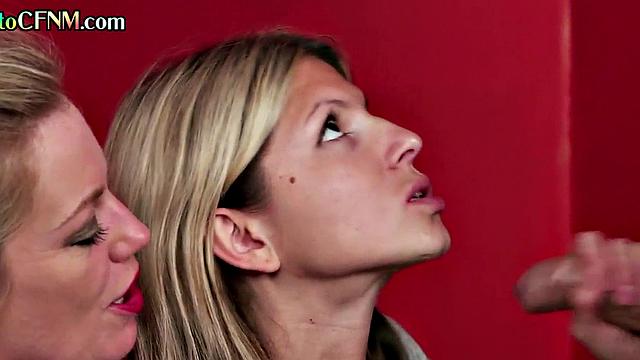 Mature CFNM lady teaching cutie how to cocksuck