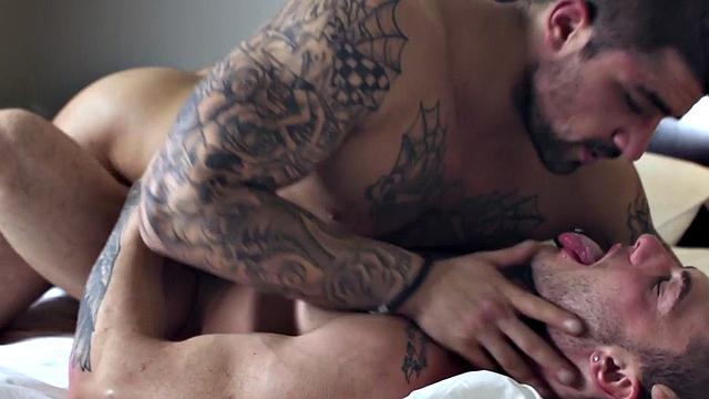 Tattooed nympho guy fucks stud in anal hole in doggystyle