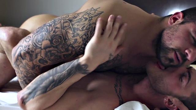 Tattooed nympho guy fucks stud in anal hole in doggystyle