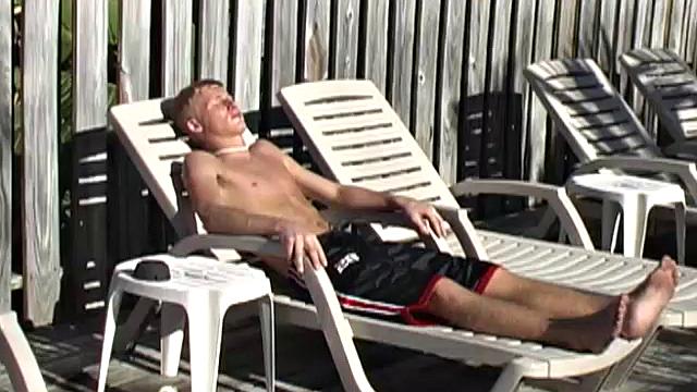 Cute skater boy Cameron Daniels is out on the sun deck relaxing when he decides to strip naked and jerk off in the sun. He goes to work on that big dick of his, edging himself several times, before deciding it's time to shoot.