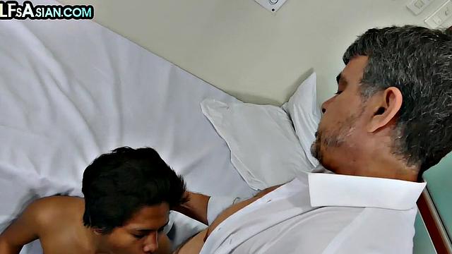 Tiny Asian twink bareback rides doctor's cock in infirmary