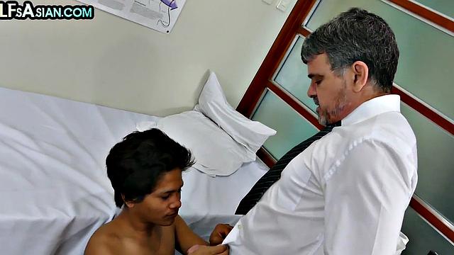 Tiny Asian twink bareback rides doctor's cock in infirmary