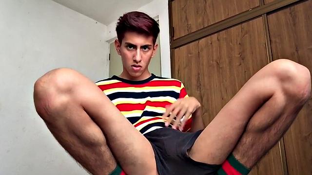 Amateur Latino strips and masturbates indoors