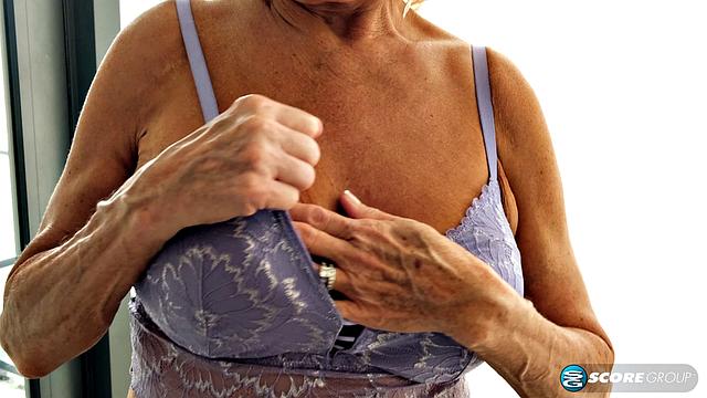 Our oldest GILF ever returns to show off her tits and finger her old snatch