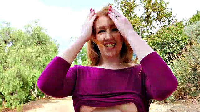 The Voluptuous Redhead