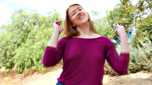 The Voluptuous Redhead