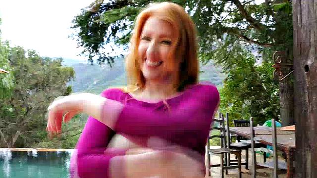 The Voluptuous Redhead