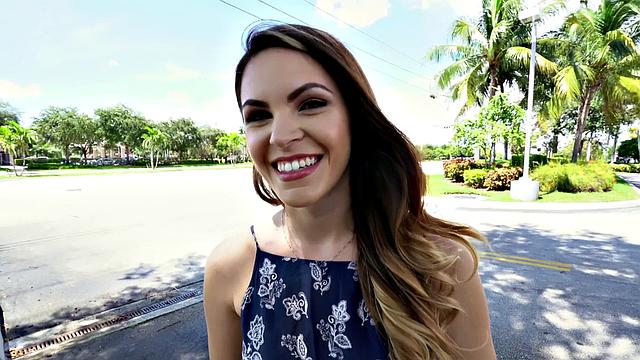 A tattooed amateur brunette gag on a hard cock in the outdoors