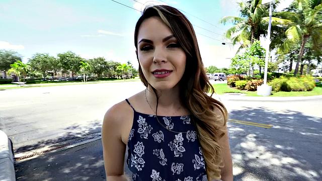 A tattooed amateur brunette gag on a hard cock in the outdoors