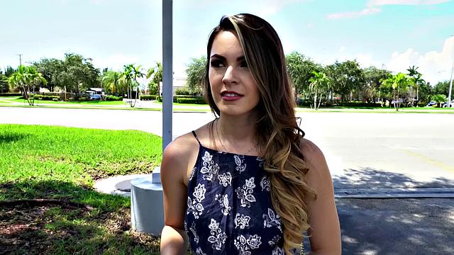 A tattooed amateur brunette gag on a hard cock in the outdoors