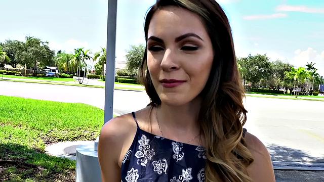 A tattooed amateur brunette gag on a hard cock in the outdoors