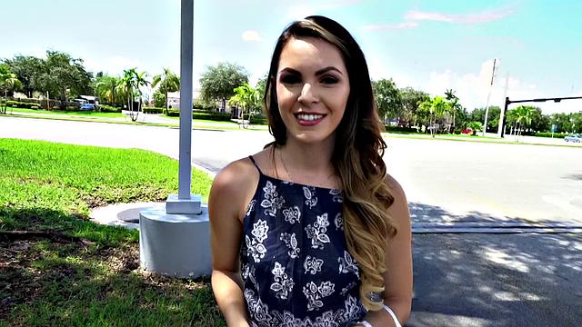 A tattooed amateur brunette gag on a hard cock in the outdoors