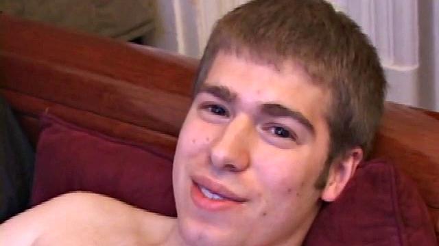 Adam Turner strips naked and grabs lube, as he checks out the porno video that's playing. He works up a boner and strokes with determination until his cum starts pumping.