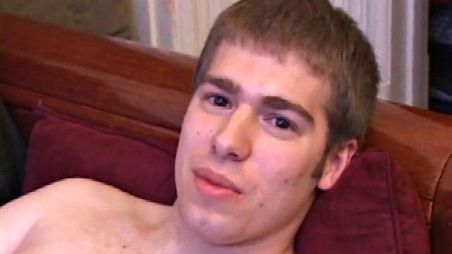 Adam Turner strips naked and grabs lube, as he checks out the porno video that's playing. He works up a boner and strokes with determination until his cum starts pumping.