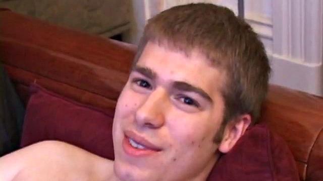 Adam Turner strips naked and grabs lube, as he checks out the porno video that's playing. He works up a boner and strokes with determination until his cum starts pumping.