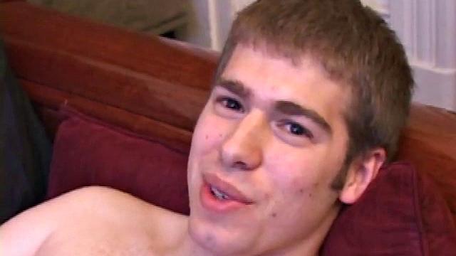 Adam Turner strips naked and grabs lube, as he checks out the porno video that's playing. He works up a boner and strokes with determination until his cum starts pumping.