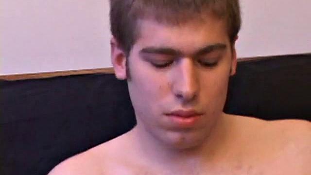 Adam Turner strips naked and grabs lube, as he checks out the porno video that's playing. He works up a boner and strokes with determination until his cum starts pumping.