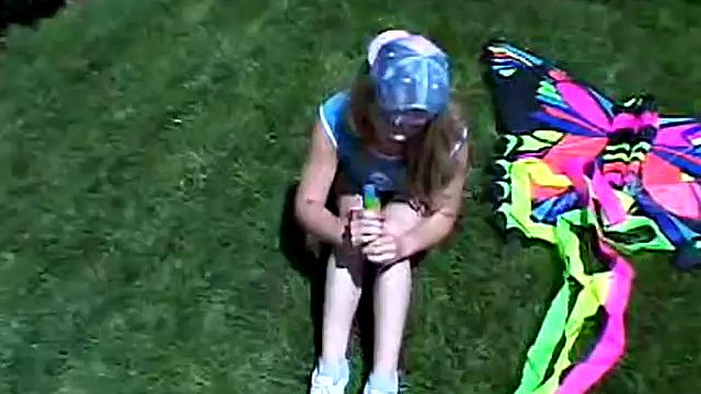 Cute April Outdoors Sucking A Popsicle