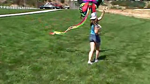 Cute April Outdoors Sucking A Popsicle