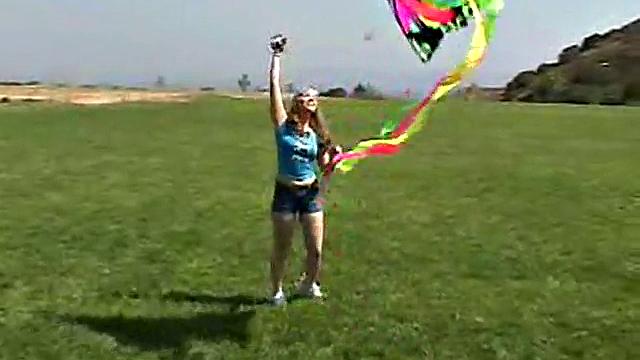 Cute April Outdoors Sucking A Popsicle