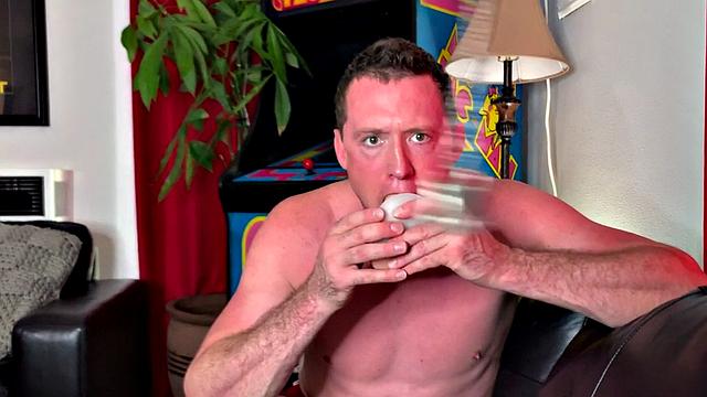 Nympho mature guy in red underwear sucks his dildo toy