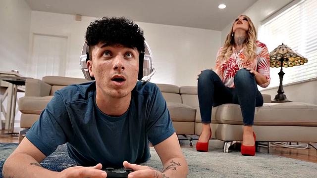 Pretty stepmom riding her gamer son's dick