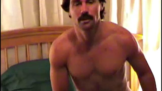 This is Robert's second video with me. He is one very handsome man, with an infectious smile. Robert is a bit short on gray matter and dick, but his personality, smile, and big load of cum more than make up for the shortcomings.