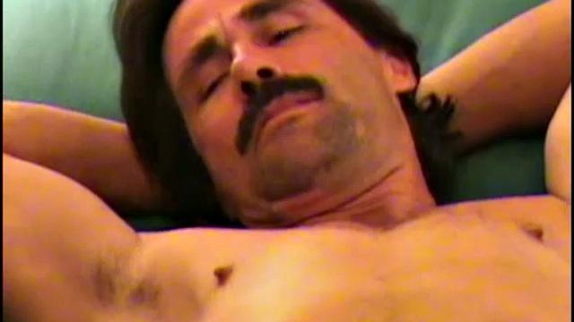 This is Robert's second video with me. He is one very handsome man, with an infectious smile. Robert is a bit short on gray matter and dick, but his personality, smile, and big load of cum more than make up for the shortcomings.