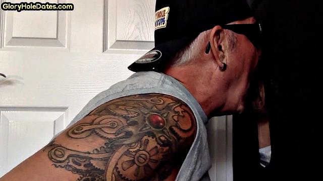 Gloryhole DILF sucks cock and swallows cum in video