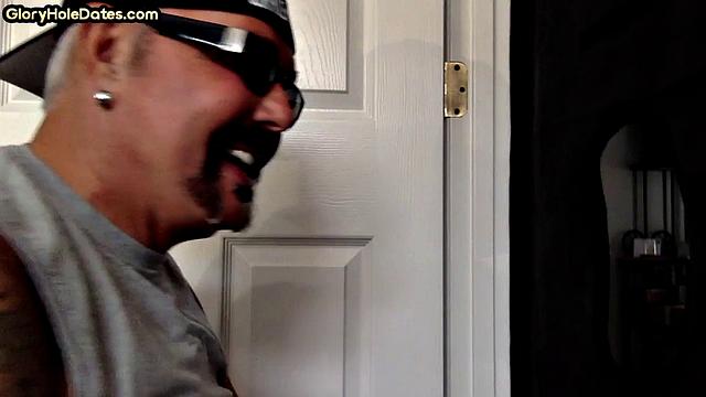 Gloryhole DILF sucks cock and swallows cum in video