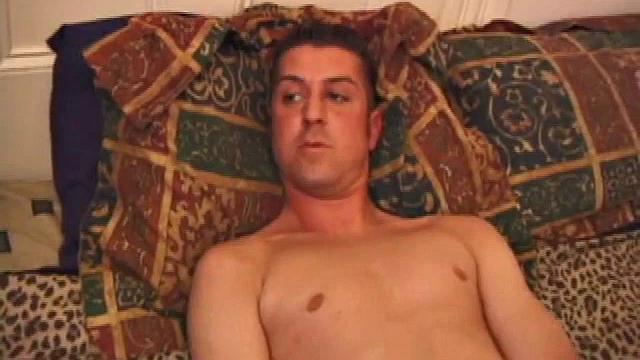 First timer Jeremy Adams seems comfortable getting naked and jerking off in front of the camera. He strokes his hard cock until he sprays his cum load.