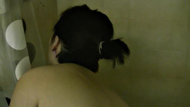 Naughty Shelly flaunts her natural tits in a steamy shower with Shower Nude